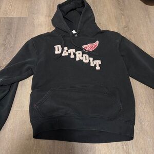NHL Black Hoodie with Red Accents